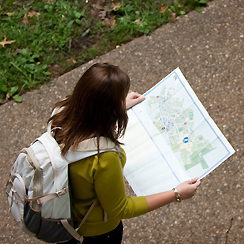Photo of student looking at a campus map.